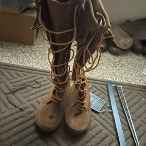 Tall lace moccasin boots